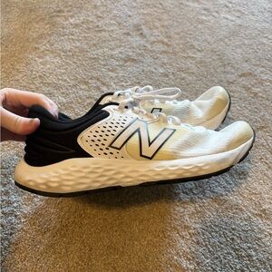 New Balance men’s White and Black Sneakers